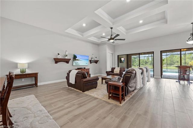 7716 Winding Cypress DR, Naples, FL 34114