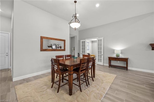 7716 Winding Cypress DR, Naples, FL 34114