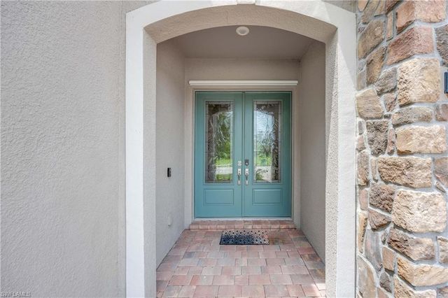 7716 Winding Cypress DR, Naples, FL 34114