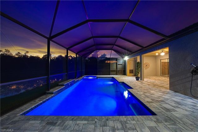 7716 Winding Cypress DR, Naples, FL 34114