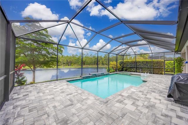 7716 Winding Cypress DR, Naples, FL 34114