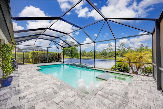 7716 Winding Cypress DR, Naples, FL 34114