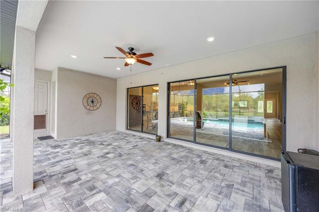 7716 Winding Cypress DR, Naples, FL 34114