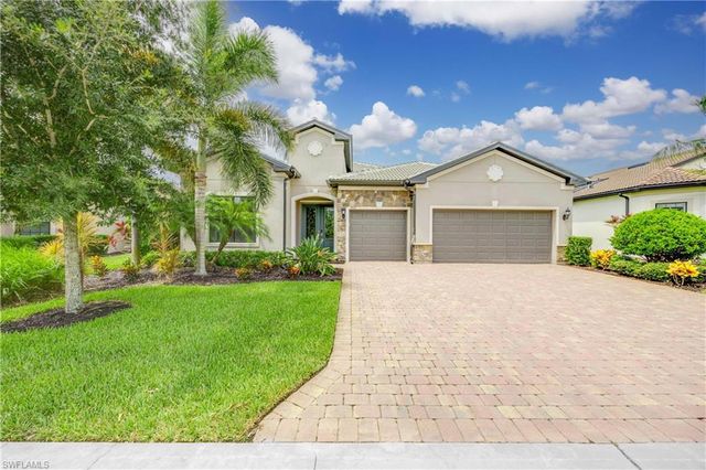 7716 Winding Cypress DR, Naples, FL 34114