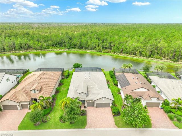 7716 Winding Cypress DR, Naples, FL 34114