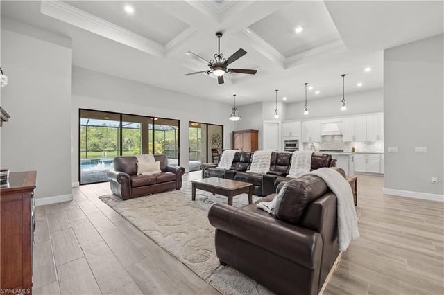 7716 Winding Cypress DR, Naples, FL 34114