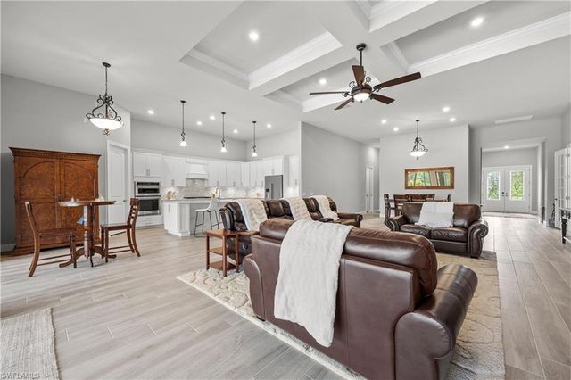 7716 Winding Cypress DR, Naples, FL 34114