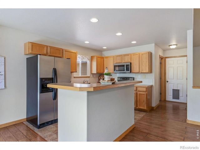 8781 Flaming Arrow Avenue, Wellington, CO 80549