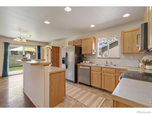 8781 Flaming Arrow Avenue, Wellington, CO 80549