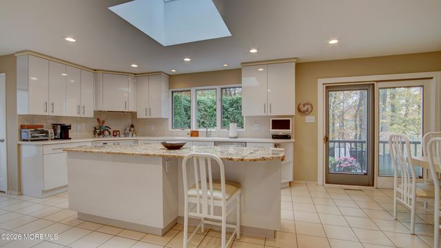 8 Manor Drive, Manalapan, NJ 07726