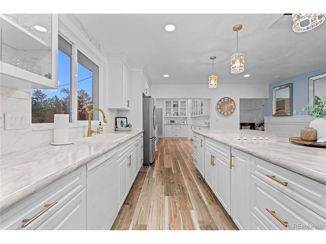 7819 Hill Crest Dr, Louviers, CO 80131