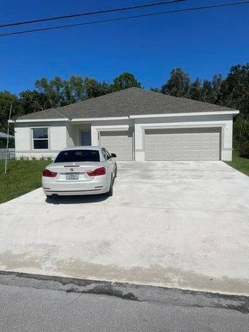 4958 NW FLINTSTONE Avenue, Port St. Lucie, FL 34983