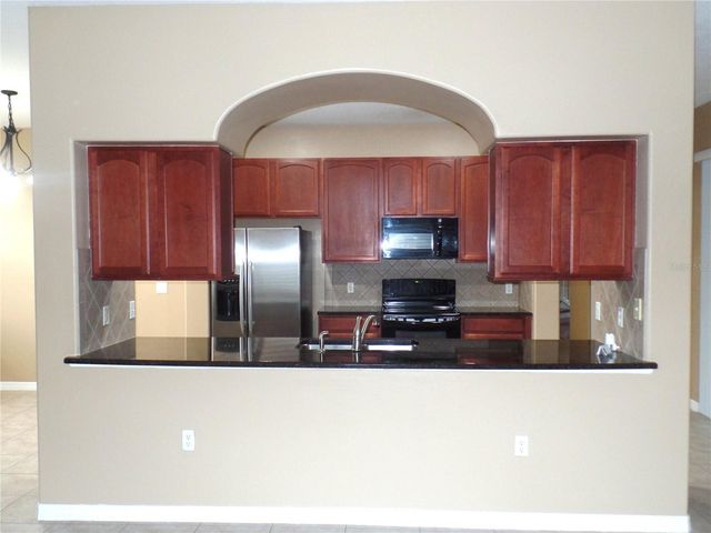 3240 PINEAPPLE ISLE DRIVE, Kissimmee, FL 34746