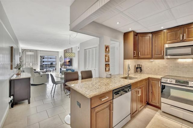 300 Golden Isles Dr 204, Hallandale Beach, FL 33009