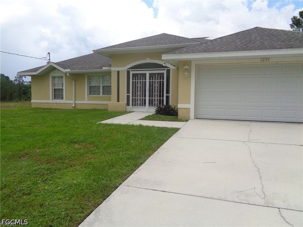 1235 Cloplon ST E, Lehigh Acres, FL 33974