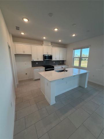 6984 BROAD WING LOOP, Howey In The Hills, FL 34737