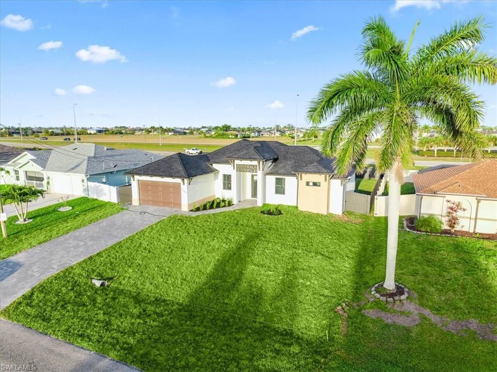 1100 NW 31st PL, CAPE CORAL, FL 33993 — exterior
