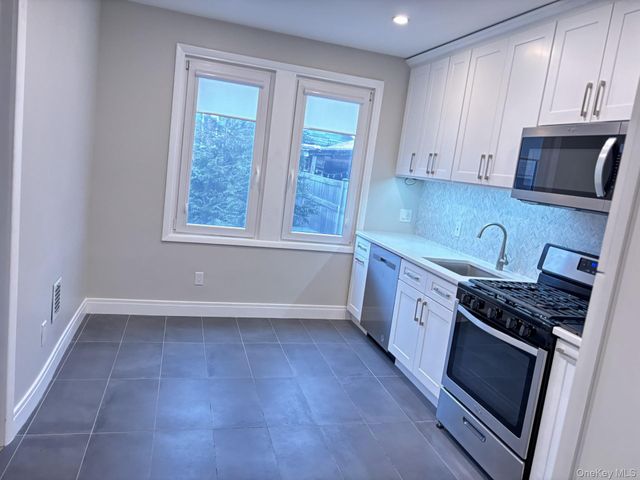 5937 57th Drive, Maspeth, NY 11378