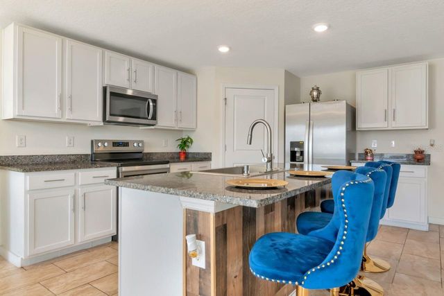 1103 SWAYING SAWGRASS AVENUE, Ruskin, FL 33570