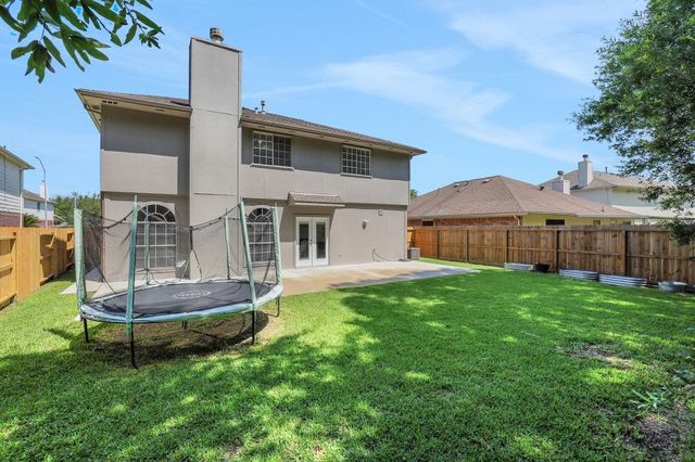 21843 Whispering Forest Drive, Kingwood, TX 77339