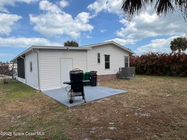 810 Thrush Circle, Barefoot Bay, FL 32976