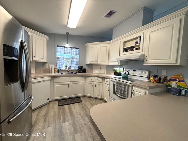 810 Thrush Circle, Barefoot Bay, FL 32976