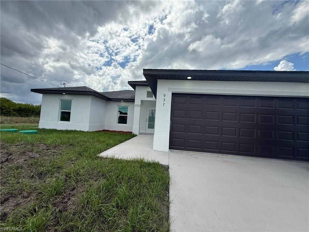 937 Grant BLVD, Lehigh Acres, FL 33974
