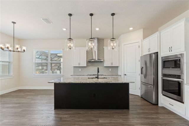 8749 DRUMMER PLANK DRIVE, Wesley Chapel, FL 33545