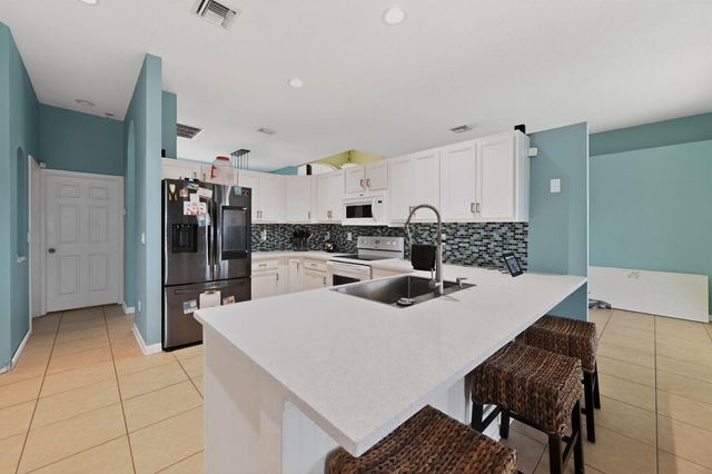 5785 NW Dublin Drive, Port St. Lucie, FL 34986
