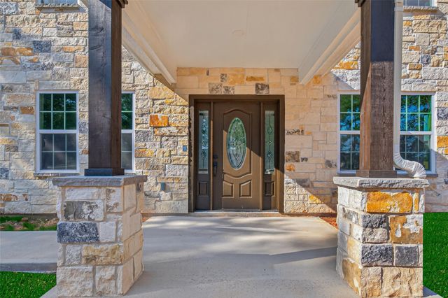 10594 Rustling Oaks Drive, Conroe, TX 77303