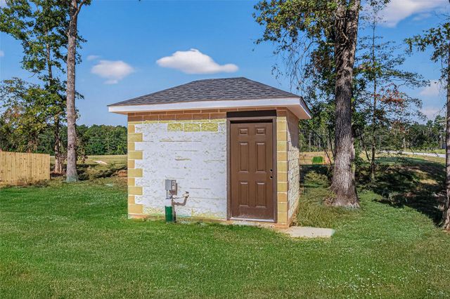 10594 Rustling Oaks Drive, Conroe, TX 77303