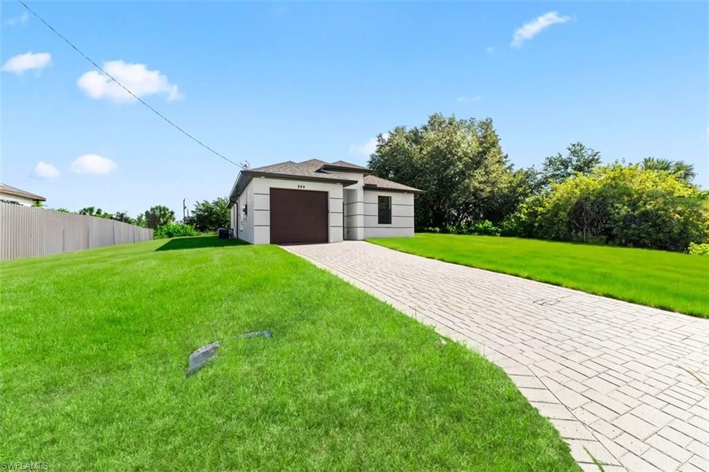 849 Wolverine ST E, LEHIGH ACRES, FL 33974 — photo 4