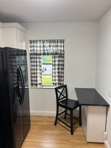 143 S LAKE SUSAN Drive S 143, West Palm Beach, FL 33411