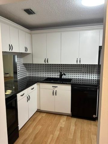143 S LAKE SUSAN Drive S 143, West Palm Beach, FL 33411