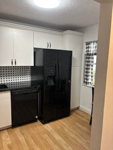 143 S LAKE SUSAN Drive S 143, West Palm Beach, FL 33411
