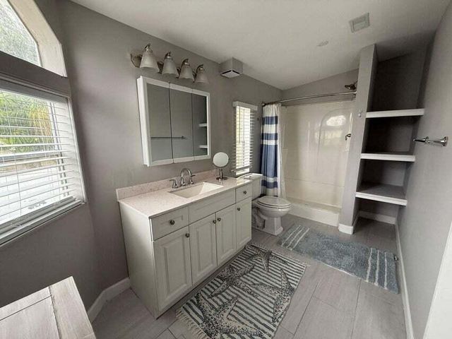 6085 Seashore Drive, Atlantis, FL 33462