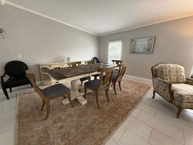 6085 Seashore Drive, Atlantis, FL 33462