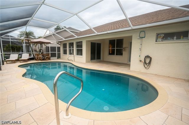 7712 Citrus Hill LN, Naples, FL 34109