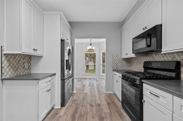 12311 Granite Woods Court, Humble, TX 77346