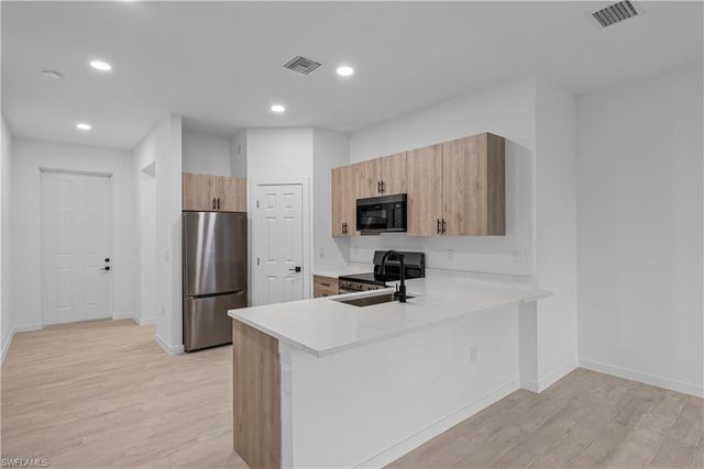 6002 Olive AVE N, Lehigh Acres, FL 33971