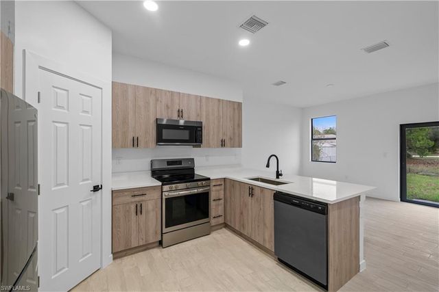 6002 Olive AVE N, Lehigh Acres, FL 33971