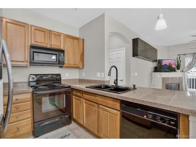 9515 Pearl Cir 104, Parker, CO 80134