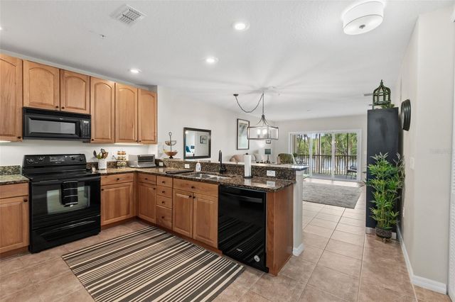 100 CANOPY WALK LANE 124, Palm Coast, FL 32137