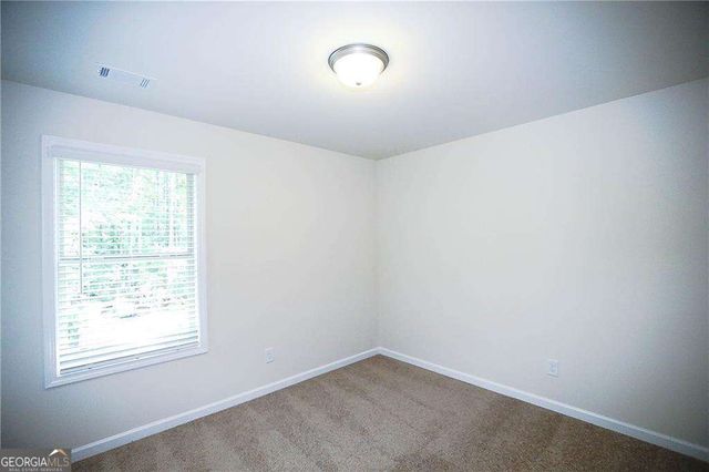 327 Cashes Court, Lilburn, GA 30047