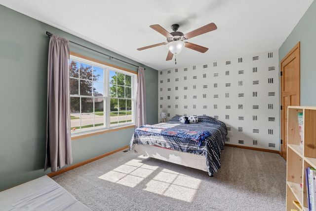 605 Danielle Court, Blue Grass, IA 52726