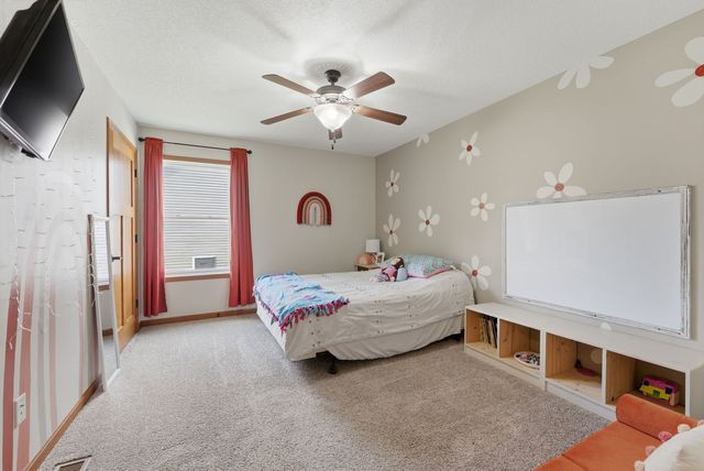 605 Danielle Court, Blue Grass, IA 52726