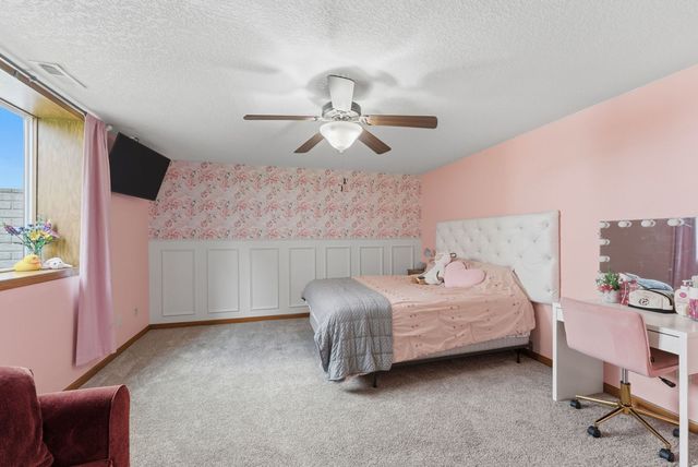 605 Danielle Court, Blue Grass, IA 52726