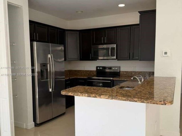 12350 S Village Cir, Davie, FL 33325