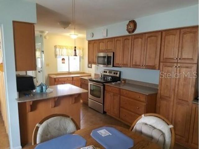 714 INDIAN WELLS AVENUE, Sun City Center, FL 33573