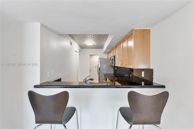 2977 Mcfarlane Rd PH9, Miami, FL 33133